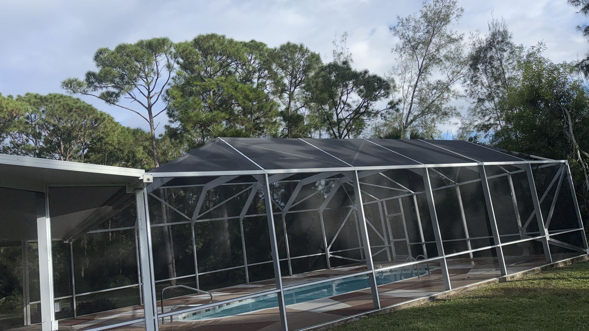 New pool cage enclosure installation in Coral Springs