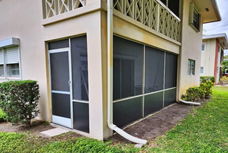 Patio sliding door repair and restoration with screened enclosure.